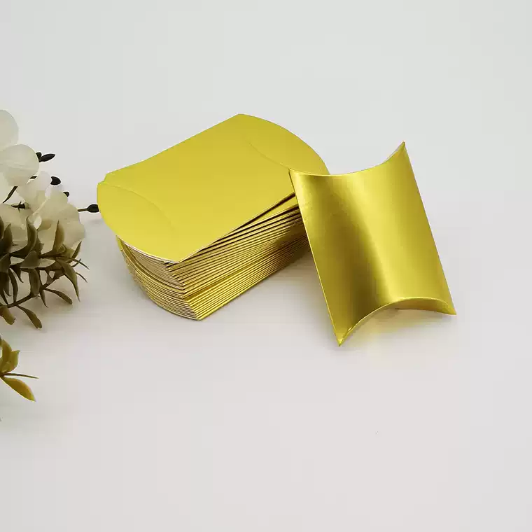 Yellow mini pillow candy gift boxes stacked together